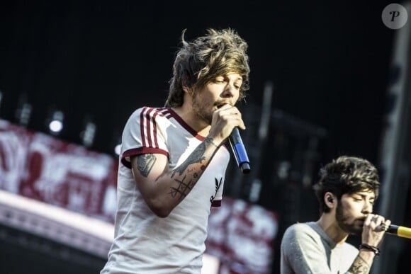 Louis Tomlinson du groupe One Direction en concert à Copenhague, le 16 juin 2014. 