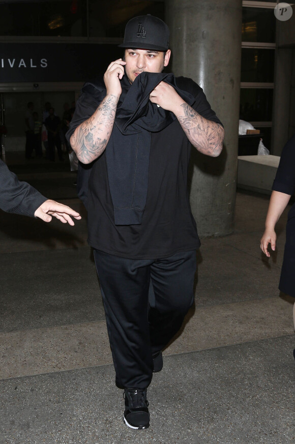 Rob Kardashian à l'aéroport de LAX à Los Angeles. Le 24 mai 2014.