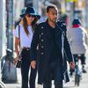 John Legend accompagne sa femme Chrissy Teigen à l'aéroport de New York, le 12 mars 2015.  