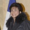 Anne Sinclair tout sourire et Pierre Nora arrivent au Palais de l'Elysée à Paris le 9 decembre 2013. L'historien a été élevé, par François Hollande, au grade de grand officier de la Légion d'honneur. 