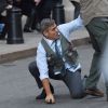 George Clooney, Jack O'Connell et Giancarlo Esposito sur le tournage de Money Monster, prochain film de Jodie Foster, à Wall Street, New York, le 11 avril 2015.