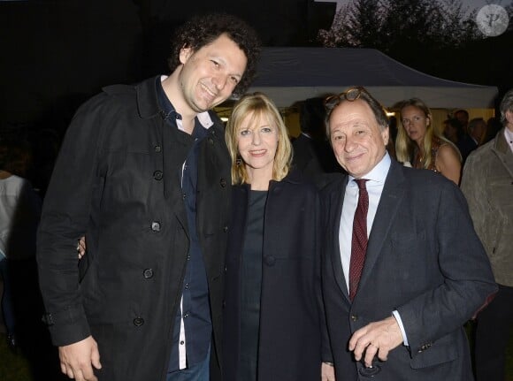 Éric Antoine et Chantal Ladesou et son mari Michel Ansault - Soirée du cinquième anniversaire du musée Paul Belmondo à Boulogne-Billancourt le 13 avril 2015. 