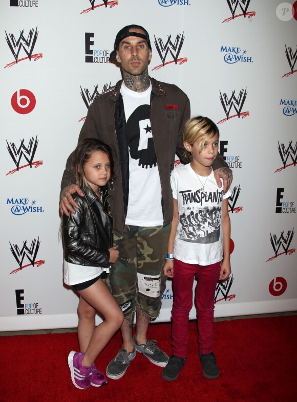 Travis Barker et ses enfants lors de la Soiree "Superstars For Hope" au Beverly Hills Hotel a Beverly Hills. Le 15 aout 2013 