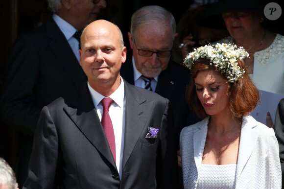 Le prince Serge de Yougoslavie et sa femme Eleonora Rajneri lors du baptême des enfants princiers Jacques et Gabriella en la cathédrale Notre-Dame-Immaculée de Monaco le 10 mai 2015