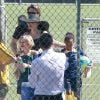 Exclusif - Brad Pitt et Angelina Jolie assistant au match de football de leurs filles Shiloh et Zahara à Los Angeles, le 14 mars 2015.