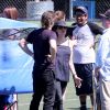 Exclusif - Brad Pitt et Angelina Jolie assistant au match de football de leurs filles Shiloh et Zahara à Los Angeles, le 14 mars 2015.