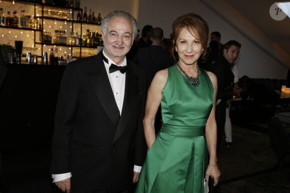 Jacques Attali et Nathalie Baye lors du dîner pour la fondation Positive Planet (ex Planet Finance) au Silencio, Cannes, le 15 mai 2015.