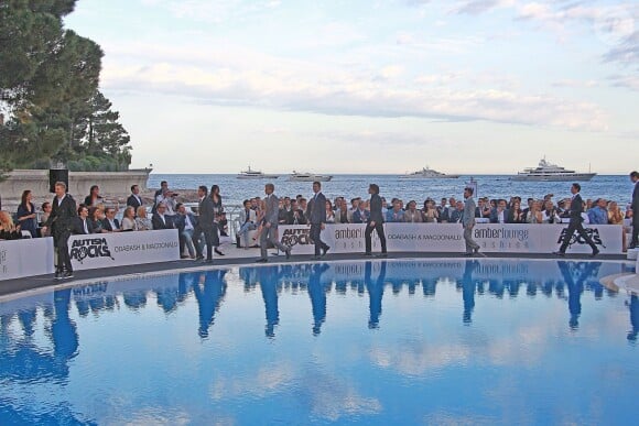 Illustration lors de la "Amber Lounge Fashion and Auction Party" à l'hôtel Méridien à Monaco, le 22 mai 2015. Dans le cadre du Grand Prix de Formule 1 de Monaco, des pilotes automobiles et leurs femmes ont défilé pour la bonne cause. "Amber Lounge Fashion and Auction Party" 