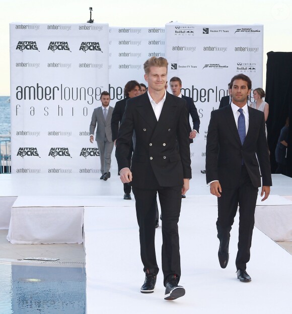 Nico Hulkenberg, Felipe Nasr ors du "Amber Lounge Fashion and Auction Party" à l'hôtel Méridien à Monaco, le 22 mai 2015. Dans le cadre du Grand Prix de Formule 1 de Monaco, des pilotes automobiles et leurs femmes ont défilé pour la bonne cause. "Amber Lounge Fashion and Auction Party"