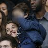 Pierre Sarkozy, Jean Sarkozy et son fils Solal lors du dernier match du Paris Saint-Germain de la saison au Parc des Princes, face à Reims, le 23 mai 2015