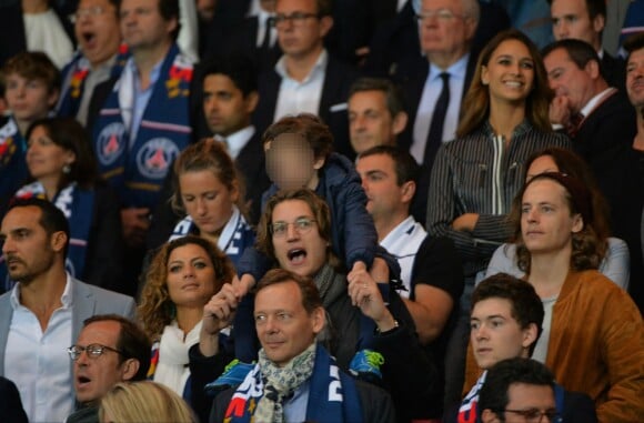 Pierre Sarkozy, Jean Sarkozy et son fils Solal lors du dernier match de la saison du Paris Saint-Germain au Parc des Princes à Paris le 23 mai 2015 face à Reims