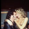Eva Herzigova fête ses 23 ans au Queen à Paris le 4 juillet 1995. Elle pose dans les bras du batteur de Bon Jovi, Tico Torres, qu'elle épousera l'année suivante.