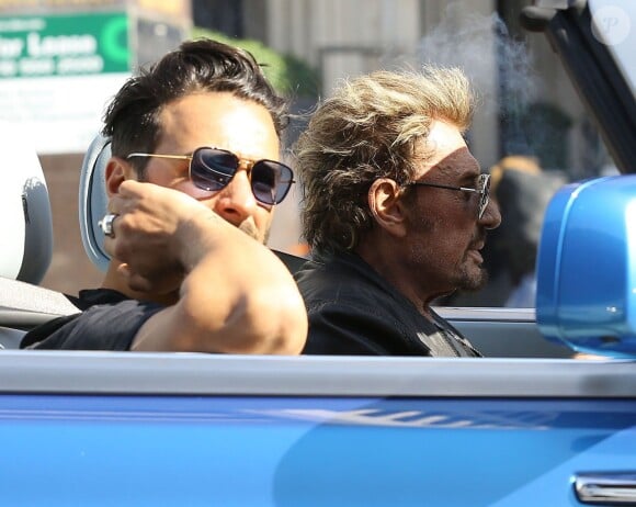 Exclusif - Johnny Hallyday et son ami Maxim Nucci se promènent en Rolls Royce à Beverly Hills, le 21 mai 2015