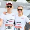 Pauline Lefèvre et Natasha Andrews lors des 10 km L'Equipe sous les couleurs de Mécénat Chirurgie Cardiaque à Paris le 14 juin 2015