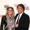 Bernard Tapie et sa fille Sophie, au UGC Normandie sur les Champs-Elysées à Paris le 31 mars 2014.