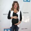 Tiffani Thiessen, enceinte d'un petit garçon à la 6e soirée annuelle de « Milk+Bookies » à Los Angeles, le 19 avril 2015