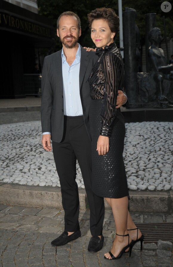 Maggie Gyllenhaal et son mari, l'acteur Peter Sarsgaard - Arrivée des people au défilé Miu Miu au Palais Iena à Paris, le 4 juillet 2015