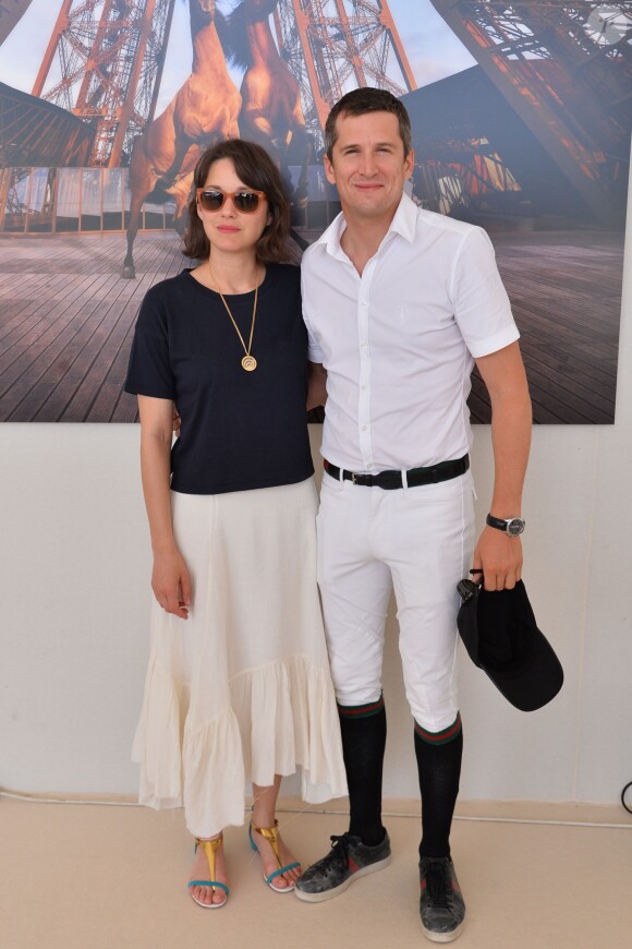 Exclusif - Marion Cotillard et son compagnon Guillaume Canet - People lors du Longines Paris Eiffel Jumping au Champ-de-Mars à Paris, le 4 juillet 2015.