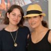 Exclusif - Marion Cotillard et Salma Hayek lors du Longines Paris Eiffel Jumping au Champ-de-Mars à Paris, le 4 juillet 2015.