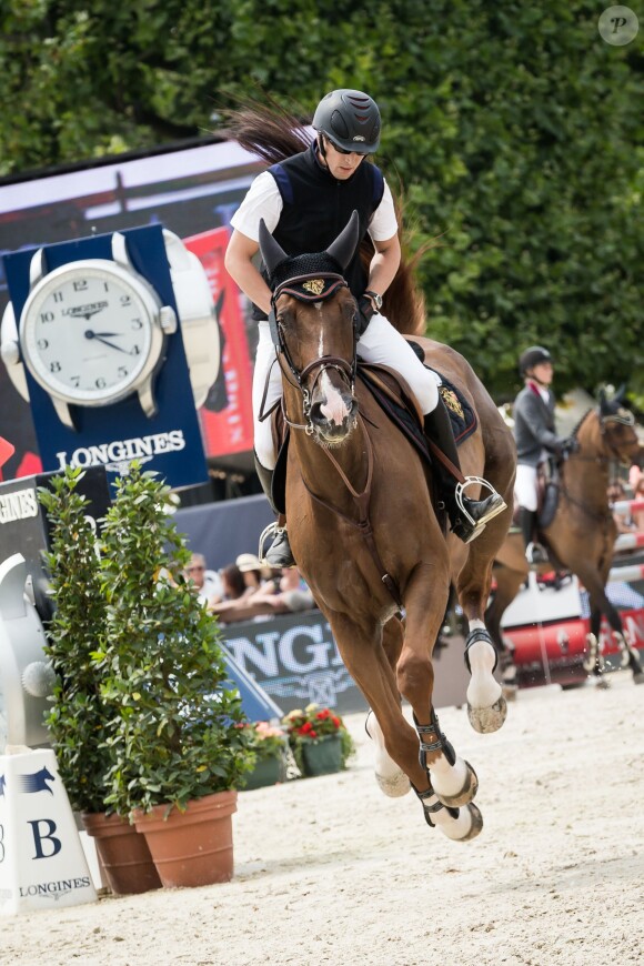 Guillaume Canet sur Sweet Boy d'Alpa finit 6ème dans le prix Laiterie de Montaigu - Longines Paris Eiffel Jumping au Champ-de-Mars à Paris, le 4 juillet 2015.
