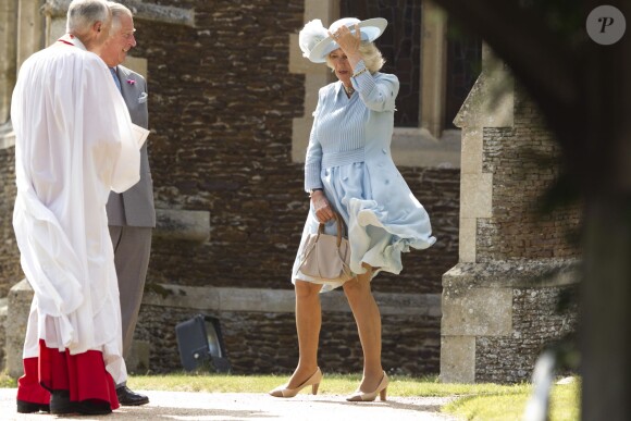 Camilla Parker Bowles, la duchesse de Cornouailles et le prince Charles lors du baptême de la princesse Charlotte en l'église Saint Mary Magdalene de Sandringham, le 5 juillet 2015
