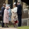 Le prince William, Kate Middleton, duchesse de Cambridge, leur fils le prince George de Cambridge, la princesse Charlotte de Cambridge, le prince Philip duc d'Edimbourg, la reine Elisabeth II et Camilla Parker Bowles, duchesse de Cornouailles lors du baptême de la princesse Charlotte en l'église Saint Mary Magdalene de Sandringham, le 5 juillet 2015