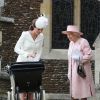 Kate Middleton, la duchesse de Cambridge et sa fille la princesse Charlotte de Cambridge, la reine Elisabeth II lors du baptême de la princesse Charlotte en l'église Saint Mary Magdalene de Sandringham, le 5 juillet 2015