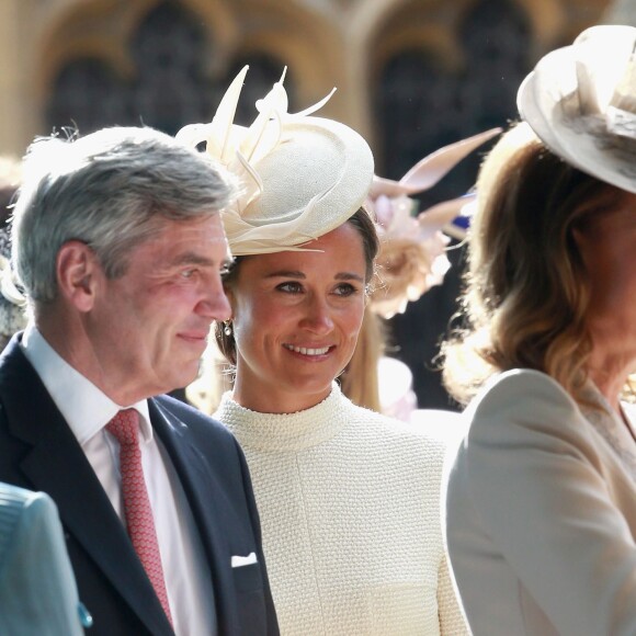 Michael Middleton, Pippa Middleton et Carole Middleton lors du baptême de la princesse Charlotte en l'église Saint Mary Magdalene de Sandringham, le 5 juillet 2015