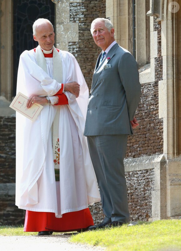 Le prince Charles lors du baptême de la princesse Charlotte en l'église Saint Mary Magdalene de Sandringham, le 5 juillet 2015