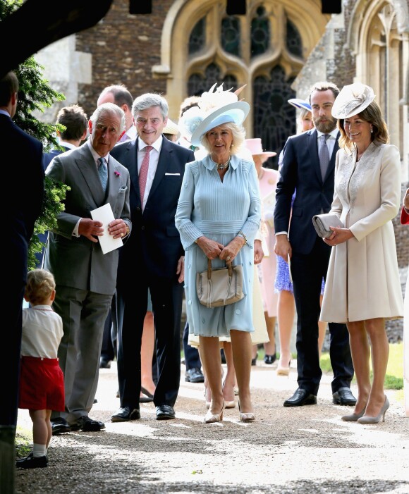 Michael Middleton, James Middleton et Carole Middleton, Camilla Parker Bowles, la duchesse de Cornouailles et le prince Charles lors du baptême de la princesse Charlotte en l'église Saint Mary Magdalene de Sandringham, le 5 juillet 2015