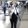 Kristin Cavallari enceinte prend un vol à l'aéroport de Los Angeles, le 9 avril 2014. 
