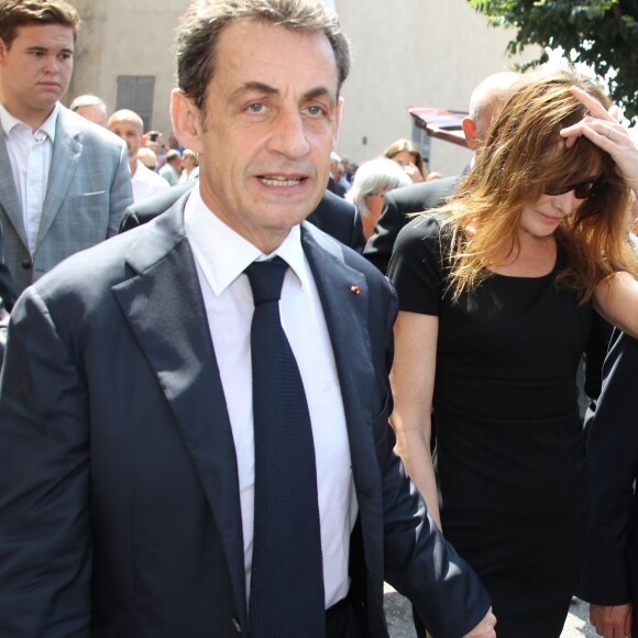 Nicolas Sarkozy et sa femme Carla Bruni-Sarkozy aux obsèques de Charles Pasqua en la cathédrale Notre-Dame du Puy à Grasse, le 7 juillet 2015.