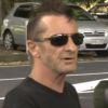 Phil Rudd (AC/DC) à sa sortie du tribunal de Tauranga (Nouvelle-Zelande) le 26 novembre 2014.