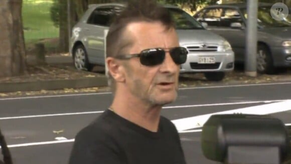 Phil Rudd (AC/DC) à sa sortie du tribunal de Tauranga (Nouvelle-Zelande) le 26 novembre 2014.