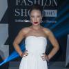 Natasha St-Pier (ici en robe bustier blanche Christophe Guillarmé au "Casa Fashion Show" au Sofitel Tour Blanche à Casablanca au Maroc le 28 mars 2015), enceinte de son premier enfant, a révélé le sexe du bébé.
