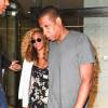 Beyoncé et Jay Z, main dans la main, quittent le 1412 Broadway à New York, le 27 juillet 2015.