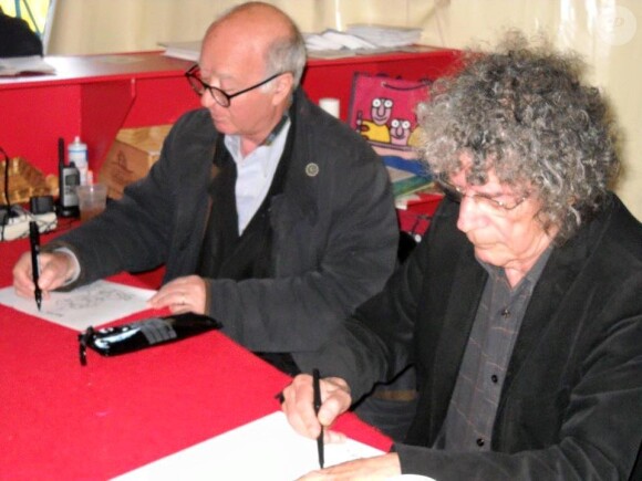 Jean-Jacques Loup avec Wolinski au Salon de l'humour de Saint-Just-Le-Martel. Le dessinateur est décédé le 31 juillet 2015
