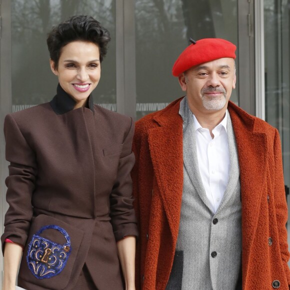 Farida Khelfa et Christian Louboutin au défilé de mode "Louis Vuitton", collection prêt-à-porter automne-hiver 2015/2016, à Paris le 11 mars 2015