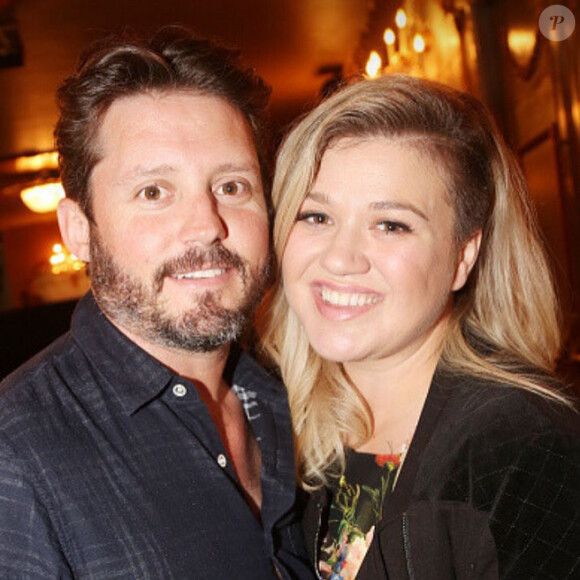 Kelly Clarkson et Brandon, photo Instagram, 2015. La chanteuse a annoncé le 19 août 2015 pendant un concert être enceinte de son deuxième enfant, avec son mari Branson.