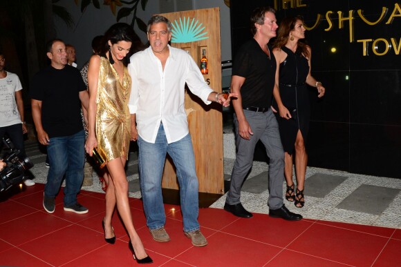 Mike Meldman, sa femme, George Clooney et sa femme Amal Alamuddin Clooney, Cindy Crawford et son mari Rande Gerber - Soirée de lancement de la marque de téquila "Casamigos" à Ibiza, le 23 août 2015.