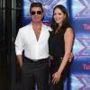 Simon Cowell et sa compagne Lauren Silverman lors du lancement de l'émission "The X Factor" au Ham Yard Hotel à Londres, le 27 août 2014.