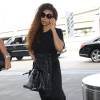 Janet Jackson prend un vol à l'aéroport de Los Angeles, le 17 juin 2015. 