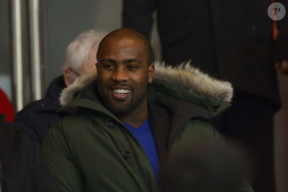 Teddy Riner lors d'un match entre le Paris Saint-Germain et l'Olympique de Marseille au Parc des Princes à Paris, le 2 mars 2014