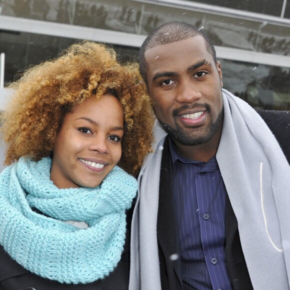 Teddy Riner et sa compagne Luthna lors de la journée "Le cheval a du Coeur" à l'Hippodrome de Paris-Vincennes, le 20 janvier 2013