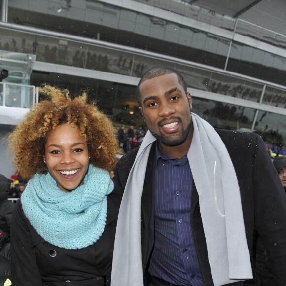 Teddy Riner et sa compagne Luthna lors de la journée "Le cheval a du Coeur" à l'Hippodrome de Paris-Vincennes, le 20 janvier 2013