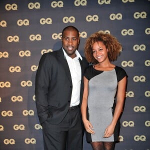 Teddy Riner et son amie Luthna lors de la soirée GQ l'Homme de l'Année 2012 au Musée d'Orsay à Paris le 16 janvier 2013