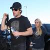 Carrie Underwood et son mari Mike Fisher arrivent a l'aeroport de Los Angeles, le 19 novembre 2012.