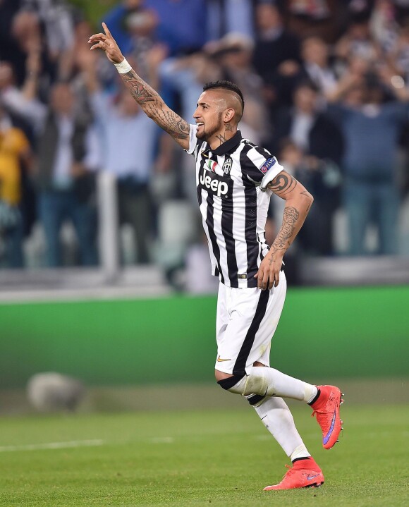 Juventus' Arturo Vidal jubilates after scoring on penalty the goal during the UEFA Champions League Quarter Final soccer match, Juventus FC Vs Monaco FC at the Juventus Stadium in Turin, Italy on April 14, 2015. Photo by Di Marco/ANSA/ABACAPRESS.COM15/04/2015 - Turin