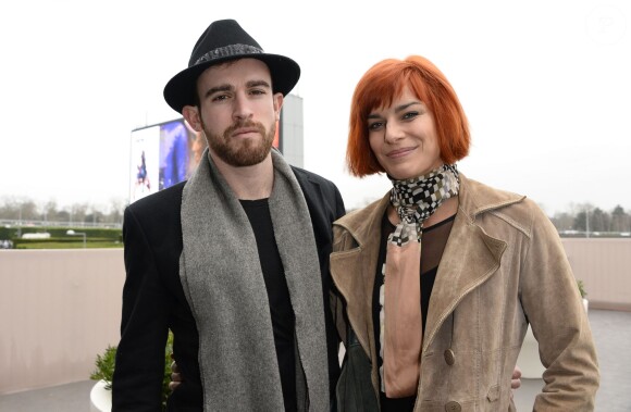 Fauve Hautot et son compagnon Jules lors du 93e Grand Prix d'Amérique à l'Hippodrome de Vincennes, le 26 janvier 2014