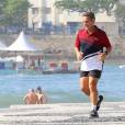Exclusif - Nicolas Sarkozy fait son footing sur la célèbre plage de Copacabana accompagné d'un garde du corps le 22 août 2015.
